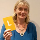 Alison Hilliard holding the letter L