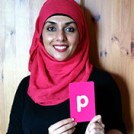 Ayisha Malik holding the letter P