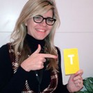 Emma Barnett holding the letter T