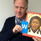 Ian Knowles with an icon and the letter W