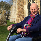 Rick Nelms in front of his church