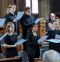 A choir rehearses carols